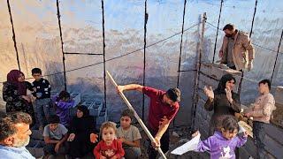 Rural life in Iran . Pern family is building a new barn next to the stable