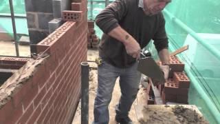 Bricklaying  to lay bricks to the line (3 of 4)