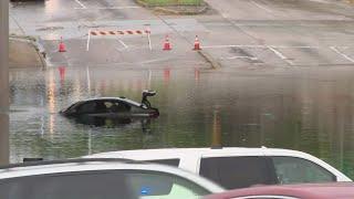 Houston drivers stranded when storm causes street flooding
