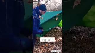 setting up Tarp tent as shelter for wind and rain