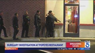 3 masked suspects steal cash from Popeyes restaurant in L.A. 