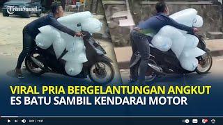 Viral Video Pria Bergelantungan Angkut Tumpukan Es Batu Sambil Kendarai Sepeda Motor