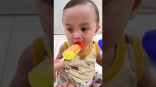 Ekspresi dedek Arash cicip Es Krim Abang Abil  #cutebaby #icecream #walls #jajanan #tuttyfruity