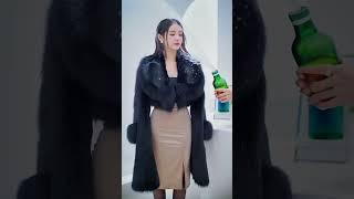 Elegant lady in satin skirt and fluffy fur coat,try to soaked her wet with water #wetlook#beer#wet