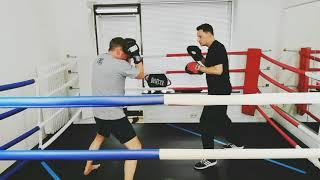 Boxtraining - Schlagkombinationen an den Pratzen