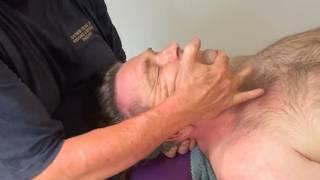 Raynor Massage- Neck and shoulder massage and adjustments. Brandon massaging Brett part 7