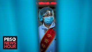 A year after virus appeared, Wuhan tells China's pandemic story