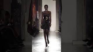 Adut Akech walks for Versace