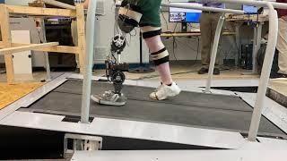 Amputee uphill walking with terrain-adaptive impedance controller on powered knee-ankle prosthesis