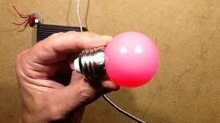 Pink LED lamp failure resulting in electrolytic capacitor venting.