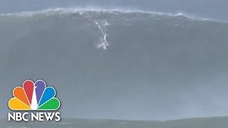 Garrett MacNamara Surfs Massive Wave In Portugal | NBC News