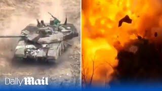 Russian battle tank is obliterated after driving over a Ukrainian mine