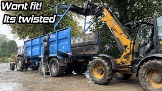 Straightening bent hydraulic tailgate on Stewart trailer