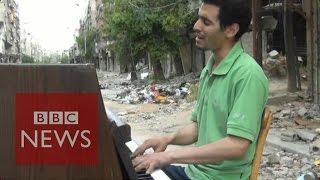 Pianist of Yarmouk films his journey from Syria to Europe - BBC News