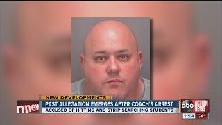 Coach charged with hitting naked teens