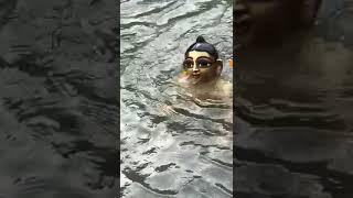 Gopal ji taking snan (Bath) in Yamuna River