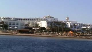 The Red sea, beach, boat with a transparent bottom/Красное море, пляж, лодка с прозрачным дном