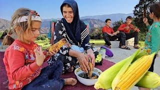 The joy of eating corn: Akram and her family eat corns together