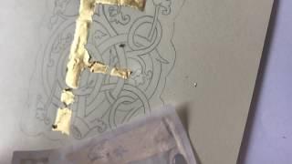 Painting and applying gold leaf to an illuminated letter