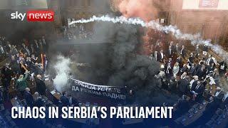 Serbian MPs set off flares and smoke grenades inside parliament