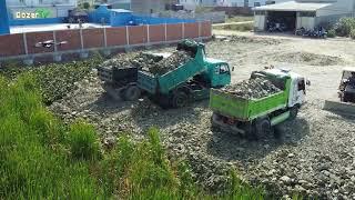 Amazing Operated Of Transport Stone Fill flooded land  By Dozer MITSUBISHI With Small Dump Trucks.