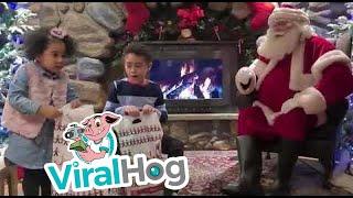 Little Girl Surprises Brother with Question About Santa's Gift || ViralHog