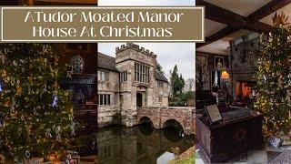 A TUDOR MOATED MANOR HOUSE DECORATED FOR CHRISTMAS