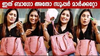 "WHATS IN MY BAG" with ANUMOL  | GINGER MEDIA