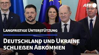 Deutschland und Ukraine schließen Sicherheitsvereinbarung | AFP