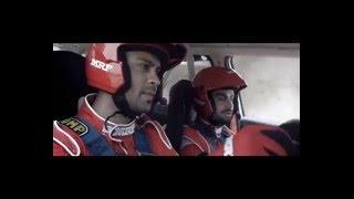 Virat Kohli and Gaurav Gill drive an MRF Rally car