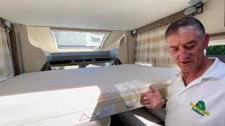 Bed demonstration in a Chausson Flash 510 motorhome