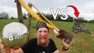 World's Largest Slingshot VS Trebuchet