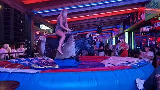 Benidorm Bull Ride Fail: Pretty Girl On Mechanical Bull. SPAIN 4K. September 2024