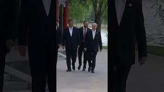 China's Xi and Russia's Putin share a hug in Beijing