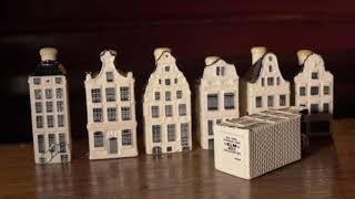 A walk along the most iconic KLM Delft Blue miniature houses in Amsterdam