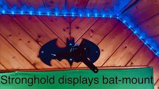 Stronghold displays Batwing wall mount stand.