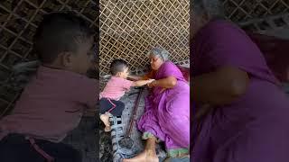 1.5 year old boy feeding his grand mother #baby boy feeding his grand mother #Saharsh serving food