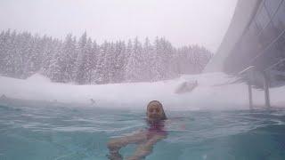 Carla Underwater swimming in a snowy day