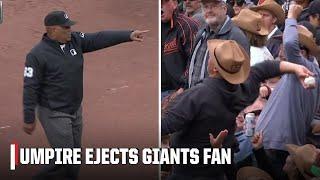 Giants fan launches foul ball back onto the field, gets ejected from the game | ESPN MLB