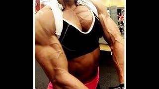 FBB Beni Lopez flexing shredded biceps and pecs