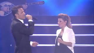 Greek singer Nikos Vertis in Israel performing -Emeis oi dyo tairiazoume- with Sarit Hadad