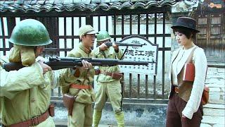 Japanese soldiers, armed with guns, try to intercept the girl, unaware that she’s a top agent.