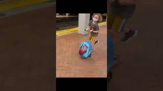 Riding robot #scooter with cool LED light up wheels at train station 