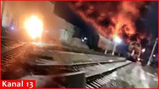 Saboteurs burn and destroy diesel locomotives carrying weapons and equipment to Russian army