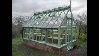 Gabled Greenhouse with lots of opening windows 114