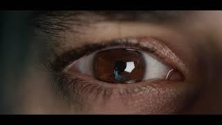 Dark brown eye opening macro   Stock Video Footage