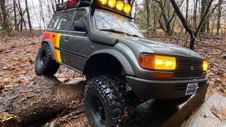 FMS FCX10 LC80 3s rainy trail run testing the stock tires capability in a wet environment