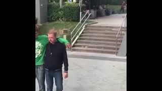 Two drunk guys fall down stairs at skatepark