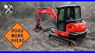 Mini Excavator Building A Dirt Access Road