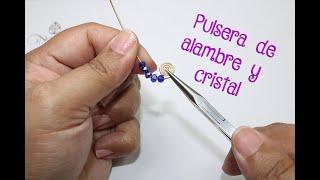 Cómo hacer una pulsera de alambre y cristal... aprende a hacer una pulsera con eslabones de espiral.